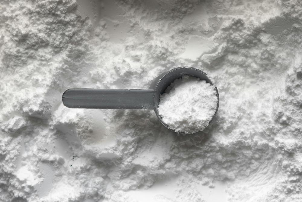 Competitive swimmer preparing nutrition and supplements for training